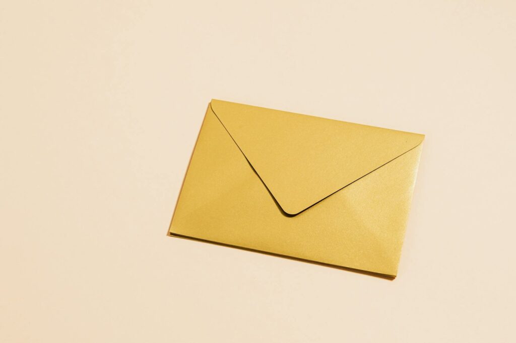 closed envelope on yellow background